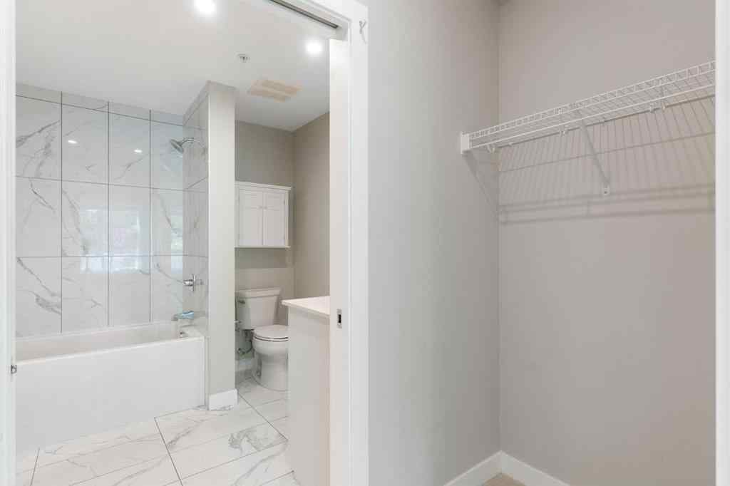 MLS® A2238671 - Unit #110 383 Smith Street NW in University District Calgary, Residential