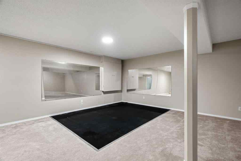 MLS® A2238675 - 207 Arbour Butte Road NW in Arbour Lake Calgary, Residential