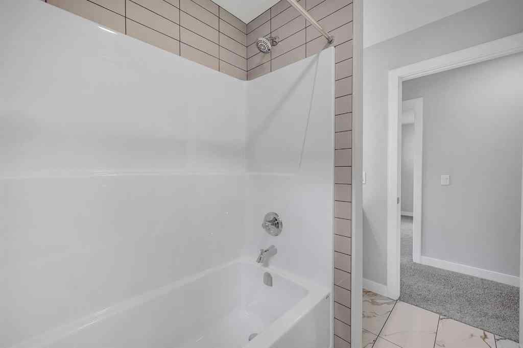 MLS® A2238679 - 1313 Midtown Road SW in Midtown Airdrie, Residential