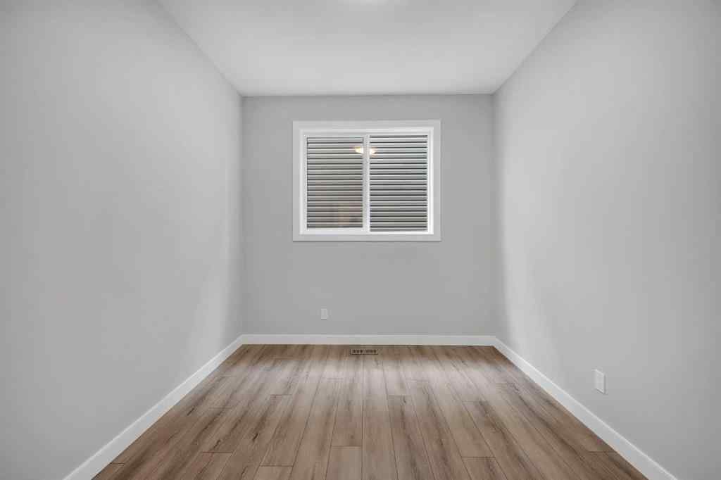 MLS® A2238679 - 1313 Midtown Road SW in Midtown Airdrie, Residential