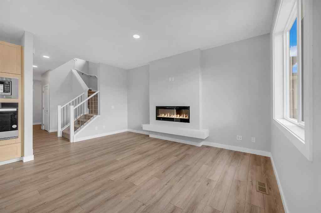 MLS® A2238679 - 1313 Midtown Road SW in Midtown Airdrie, Residential