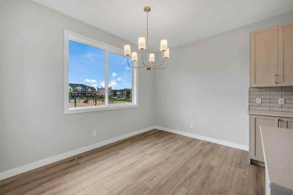 MLS® A2238679 - 1313 Midtown Road SW in Midtown Airdrie, Residential
