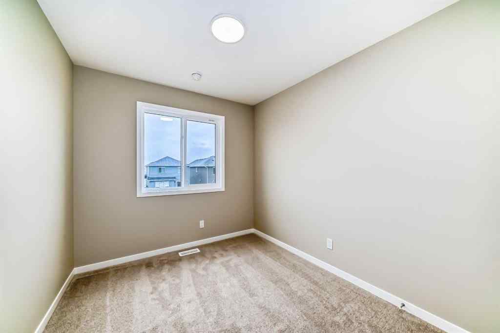 MLS® A2238781 - 397 Hotchkiss Drive  in Hotchkiss Calgary, Residential