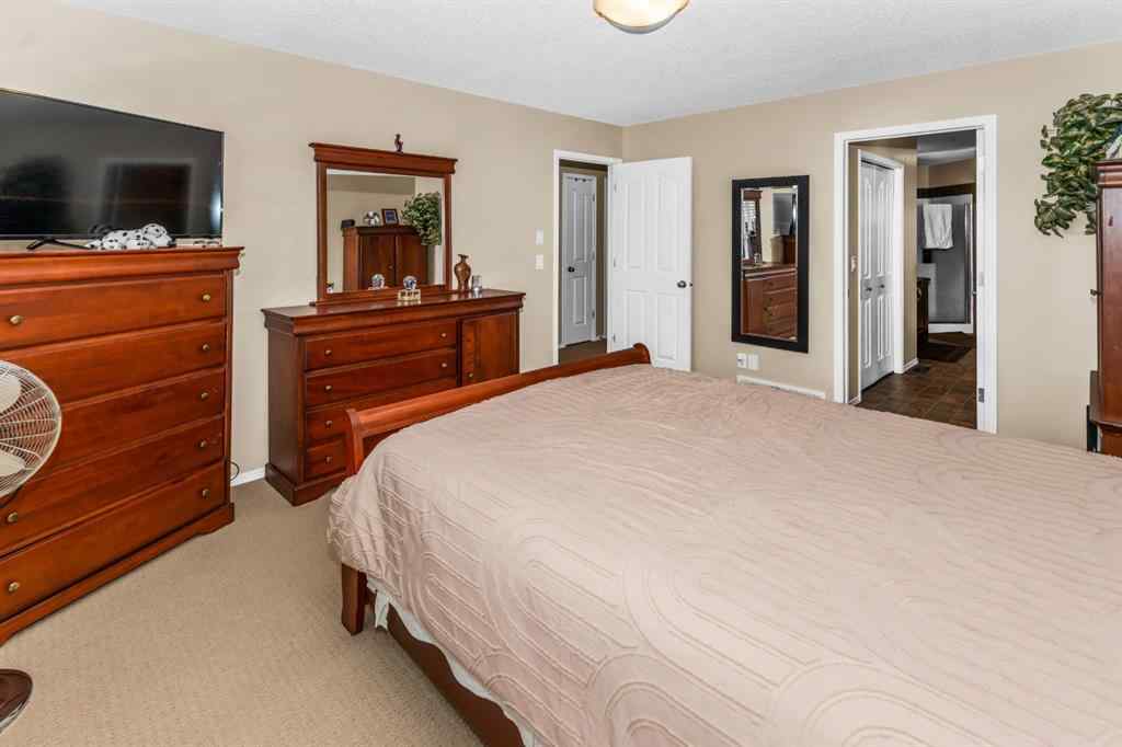 MLS® A2238828 - 107 Everoak Green SW in Evergreen Calgary, Residential