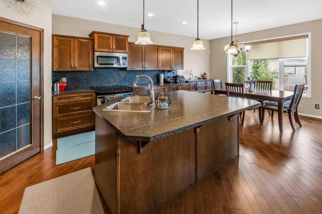 MLS® A2238828 - 107 Everoak Green SW in Evergreen Calgary, Residential