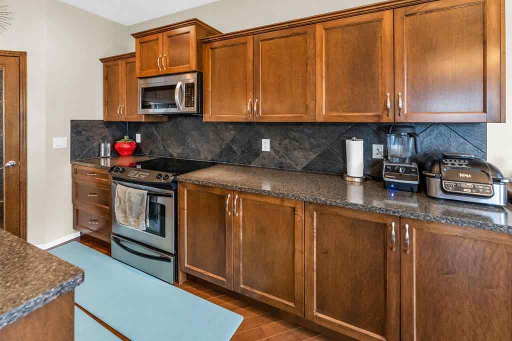 MLS® A2238828 - 107 Everoak Green SW in Evergreen Calgary, Residential