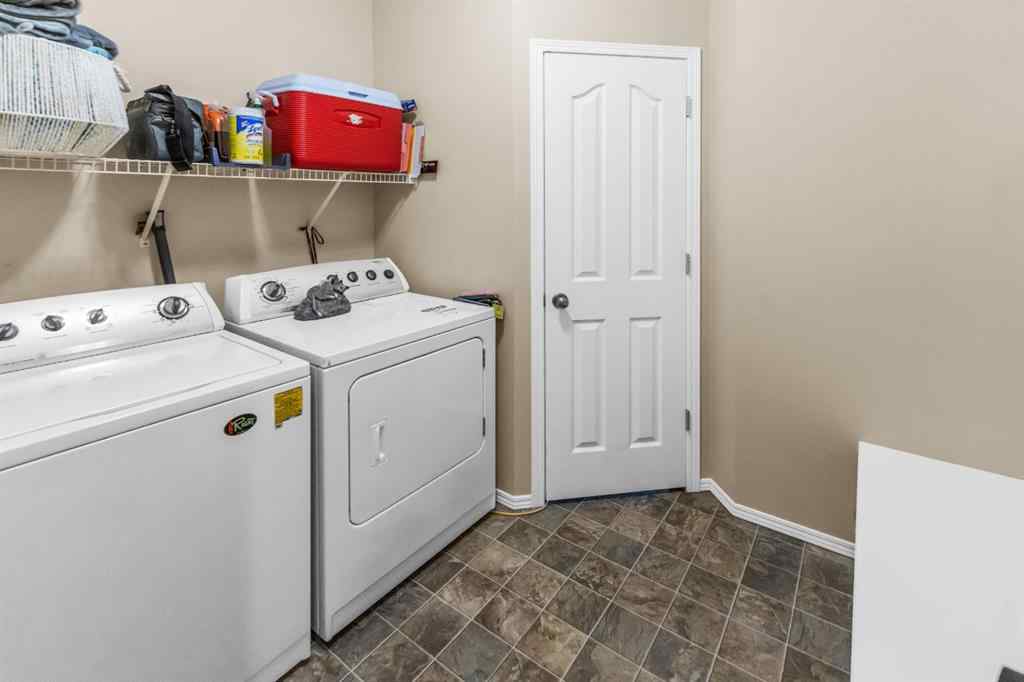 MLS® A2238828 - 107 Everoak Green SW in Evergreen Calgary, Residential