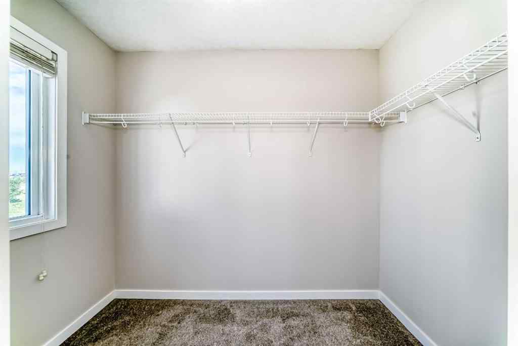 MLS® A2238861 - 203 Copperstone Park SE in Copperfield Calgary, Residential