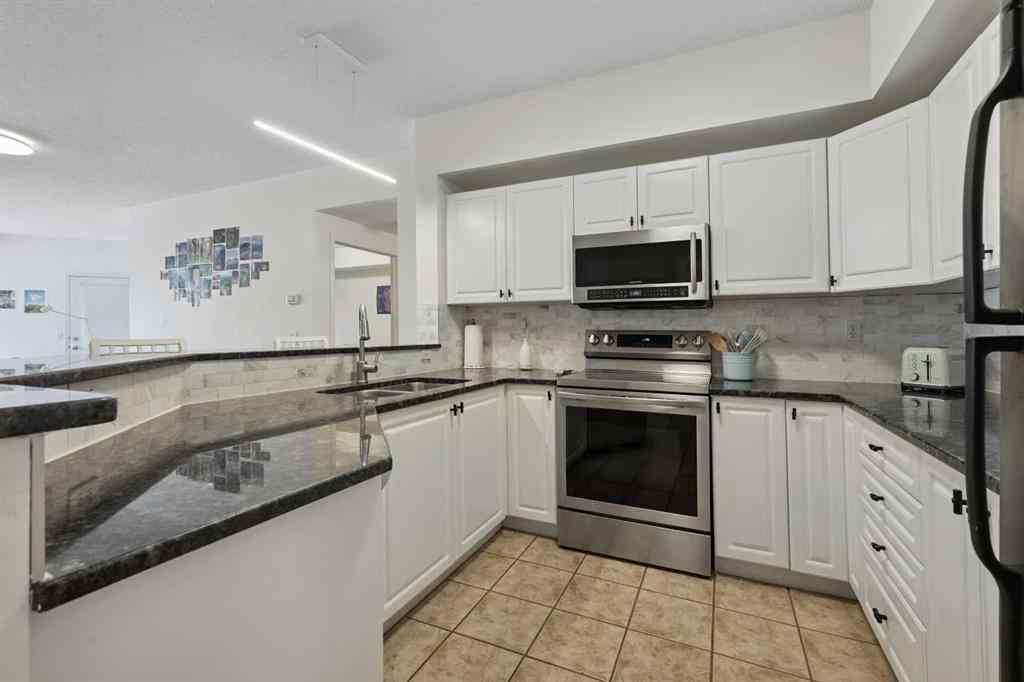 MLS® A2238900 - Unit #207 838 19 Avenue SW in Lower Mount Royal Calgary, Residential