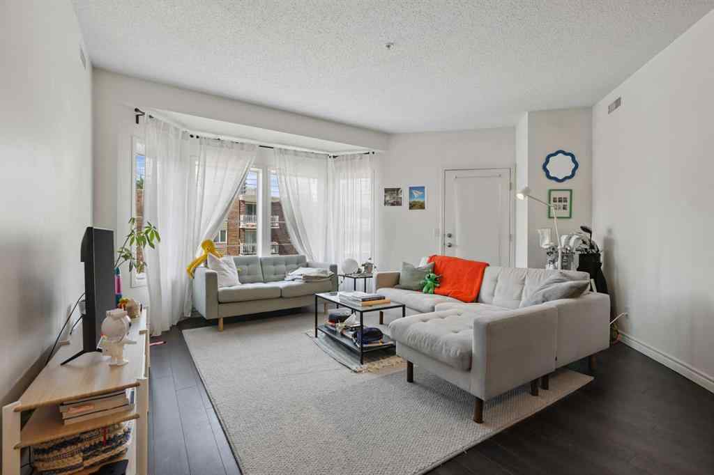 MLS® A2238900 - Unit #207 838 19 Avenue SW in Lower Mount Royal Calgary, Residential