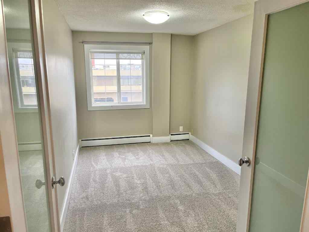 MLS® A2238957 - Unit #207 501 57 Avenue SW in Windsor Park Calgary, Residential