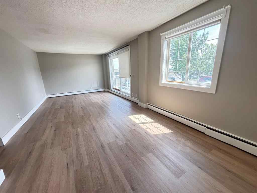 MLS® A2238957 - Unit #207 501 57 Avenue SW in Windsor Park Calgary, Residential