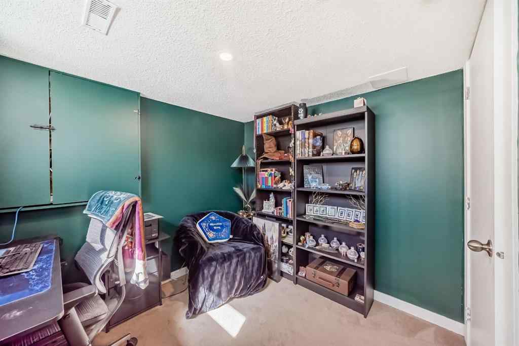 MLS® A2238960 - 165 Eversyde Boulevard SW in Evergreen Calgary, Residential