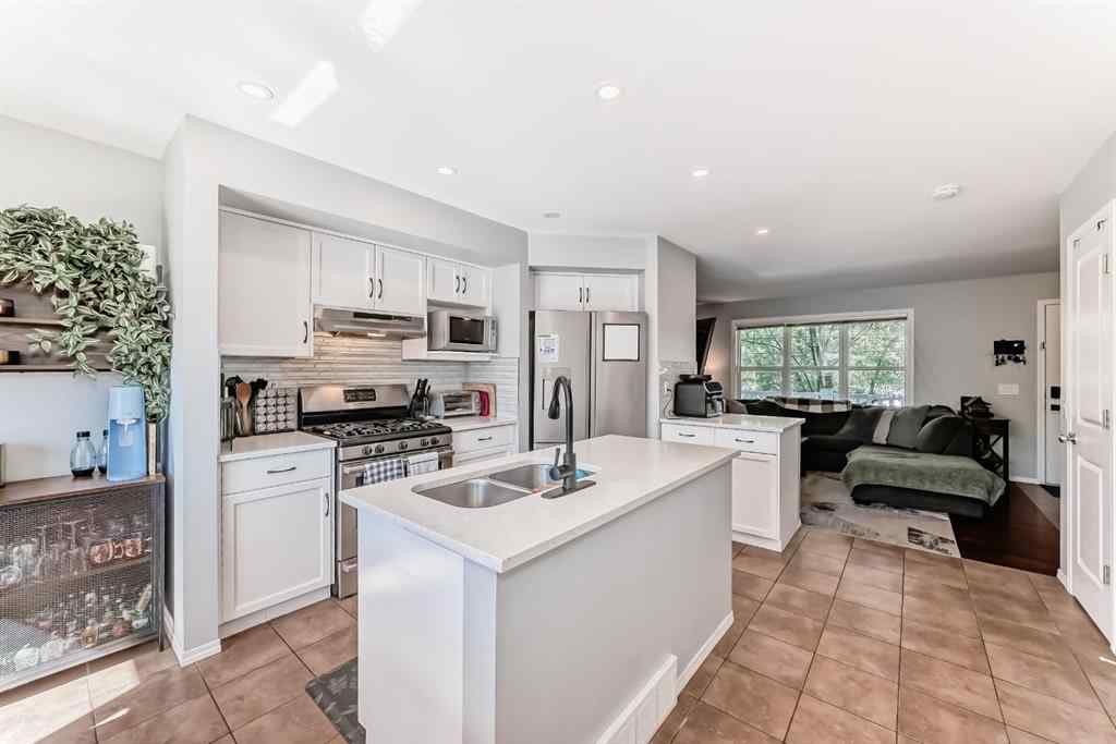 MLS® A2238960 - 165 Eversyde Boulevard SW in Evergreen Calgary, Residential
