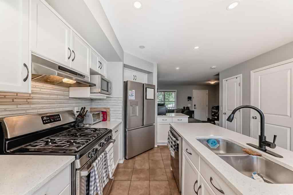 MLS® A2238960 - 165 Eversyde Boulevard SW in Evergreen Calgary, Residential