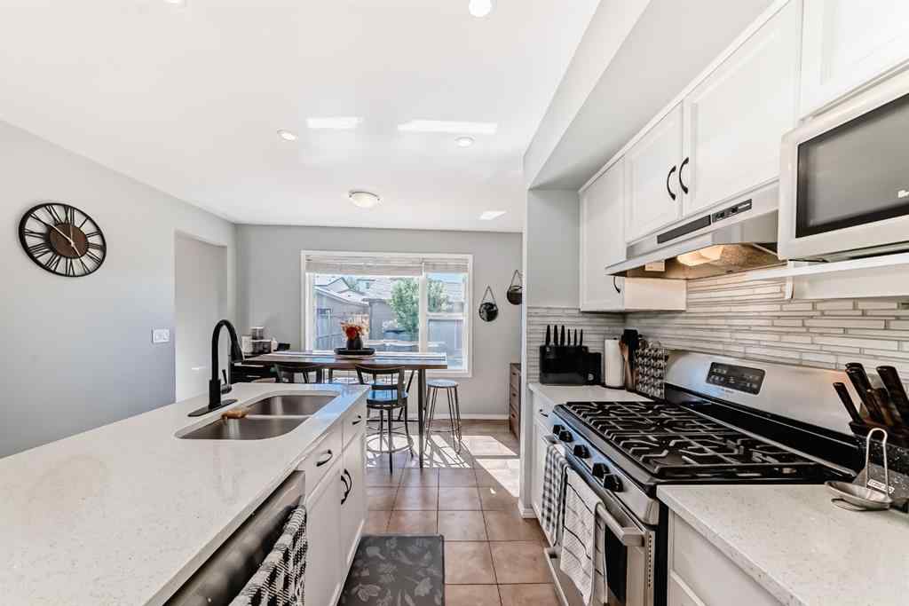 MLS® A2238960 - 165 Eversyde Boulevard SW in Evergreen Calgary, Residential