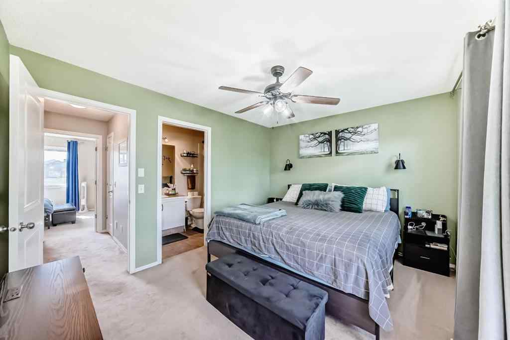 MLS® A2238960 - 165 Eversyde Boulevard SW in Evergreen Calgary, Residential