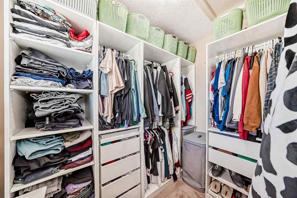 MLS® A2238960 - 165 Eversyde Boulevard SW in Evergreen Calgary, Residential
