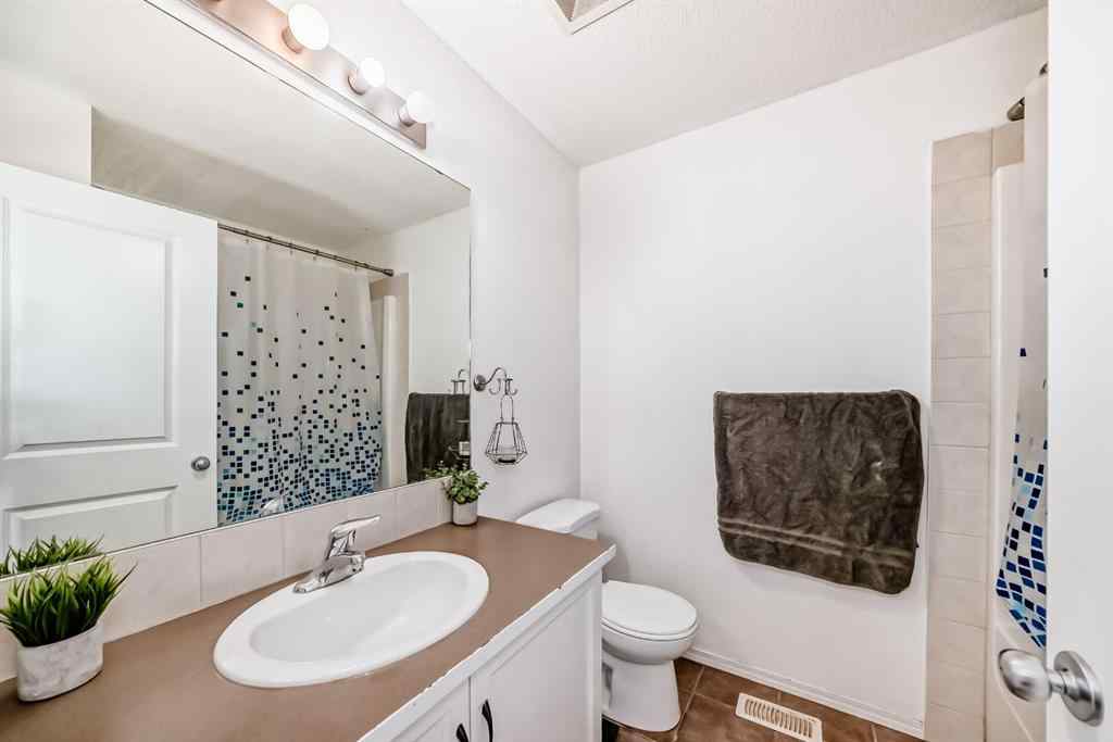 MLS® A2238960 - 165 Eversyde Boulevard SW in Evergreen Calgary, Residential