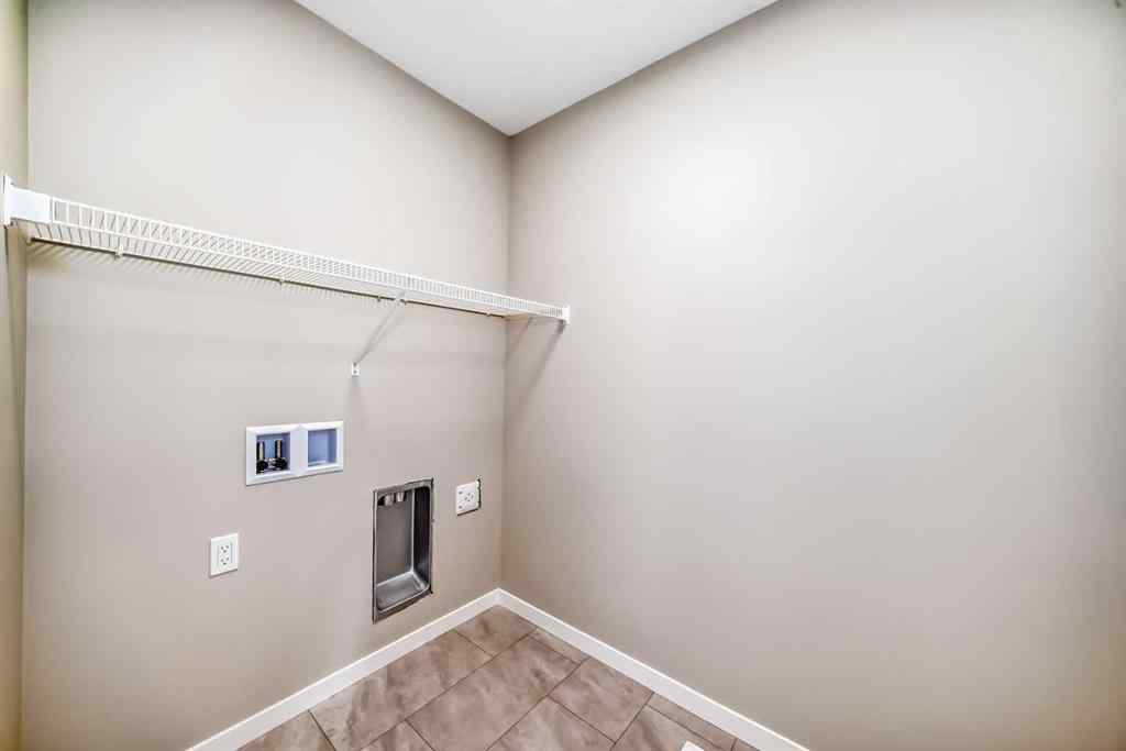 MLS® A2238995 - 385 Hotchkiss Drive SE in Hotchkiss Calgary, Residential