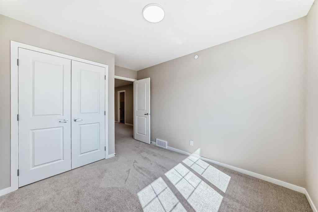 MLS® A2238995 - 385 Hotchkiss Drive SE in Hotchkiss Calgary, Residential