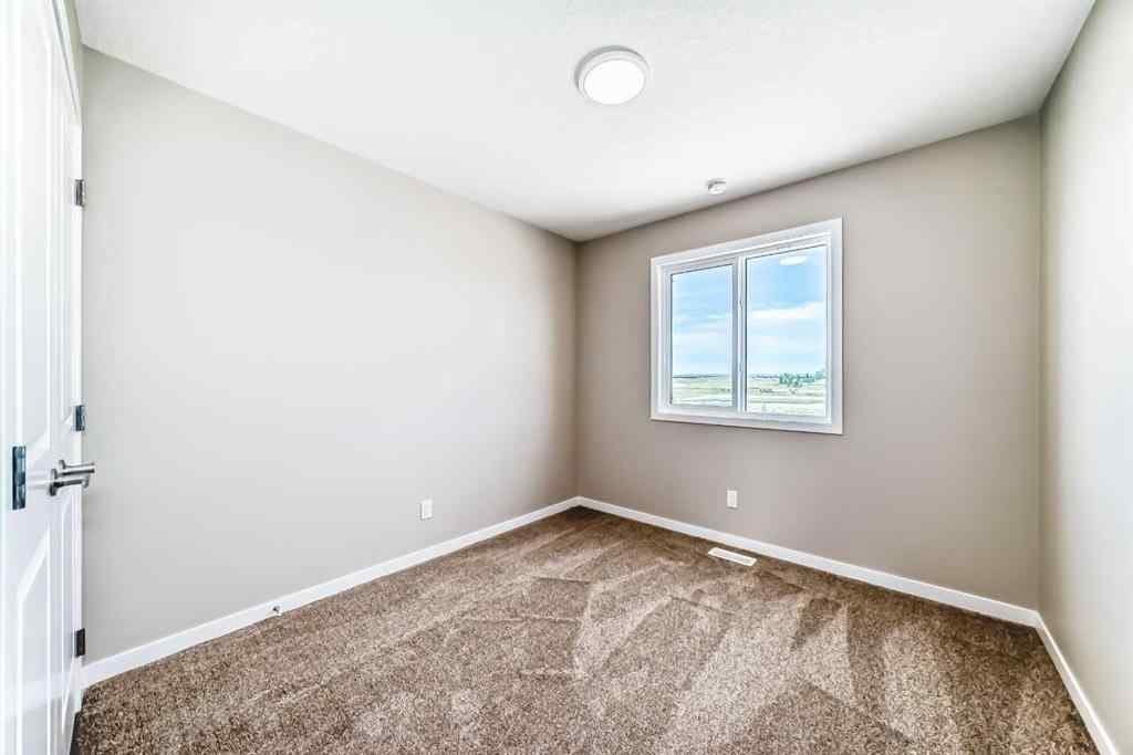 MLS® A2239003 - 413 Hotchkiss Drive SE in Hotchkiss Calgary, Residential