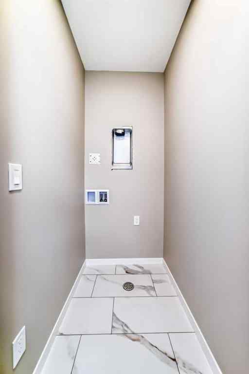 MLS® A2239003 - 413 Hotchkiss Drive SE in Hotchkiss Calgary, Residential