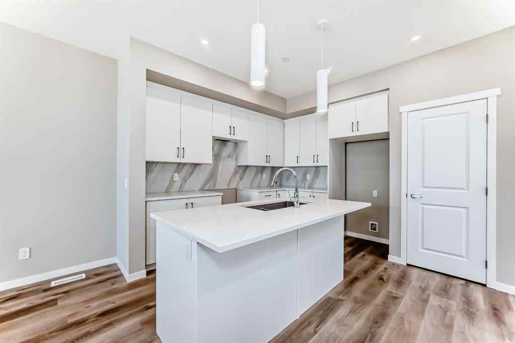 MLS® A2239003 - 413 Hotchkiss Drive SE in Hotchkiss Calgary, Residential