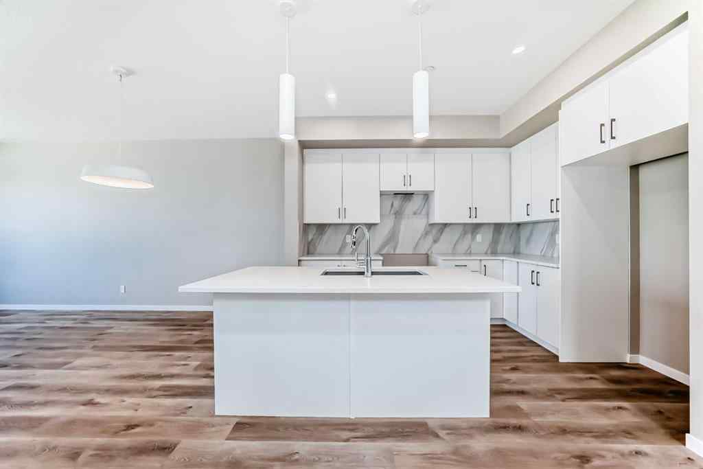 MLS® A2239003 - 413 Hotchkiss Drive SE in Hotchkiss Calgary, Residential