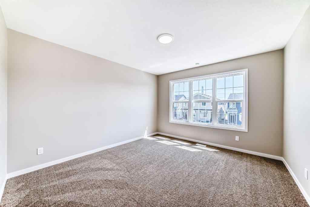 MLS® A2239003 - 413 Hotchkiss Drive SE in Hotchkiss Calgary, Residential