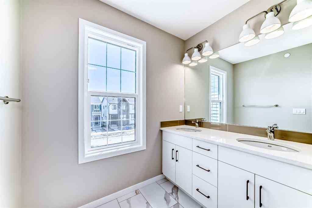 MLS® A2239003 - 413 Hotchkiss Drive SE in Hotchkiss Calgary, Residential