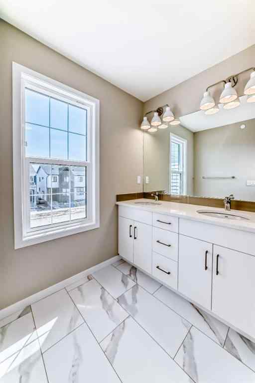MLS® A2239003 - 413 Hotchkiss Drive SE in Hotchkiss Calgary, Residential