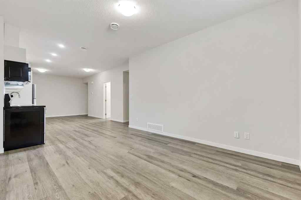 MLS® A2239031 - 1233 Copperfield Boulevard SE in Copperfield Calgary, Residential