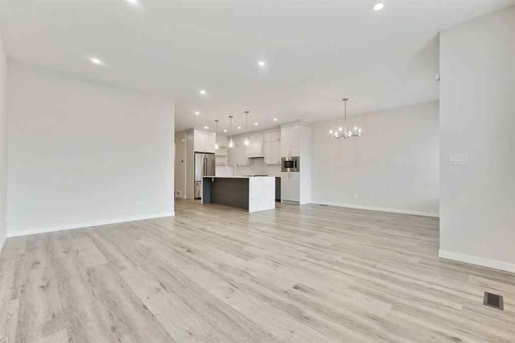 MLS® A2239031 - 1233 Copperfield Boulevard SE in Copperfield Calgary, Residential