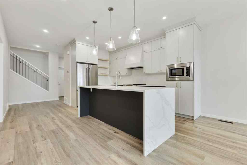 MLS® A2239031 - 1233 Copperfield Boulevard SE in Copperfield Calgary, Residential
