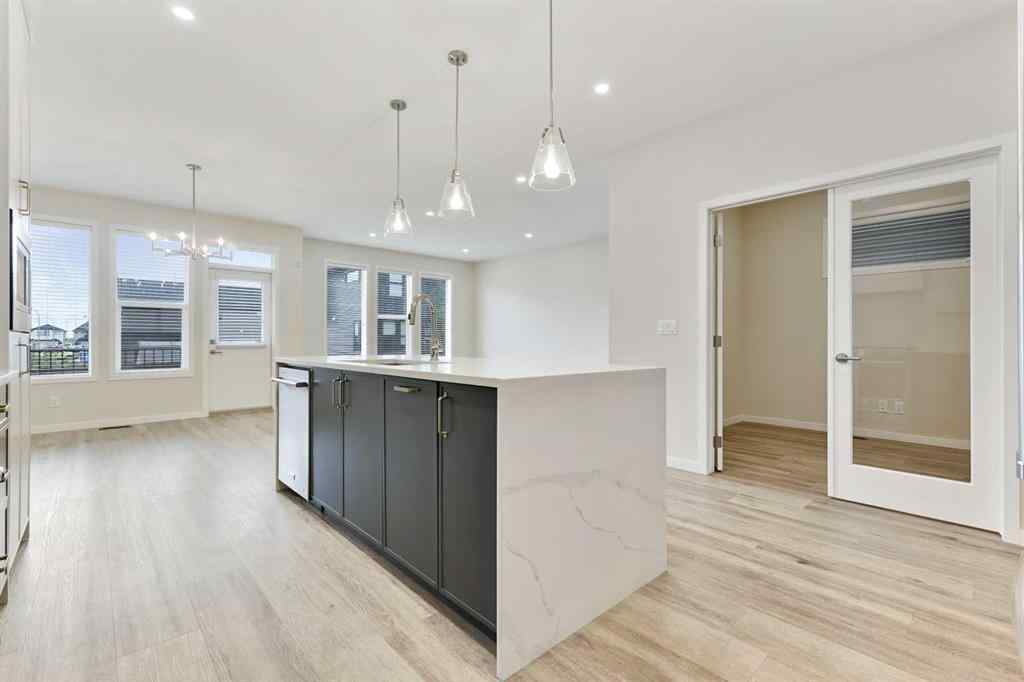 MLS® A2239031 - 1233 Copperfield Boulevard SE in Copperfield Calgary, Residential