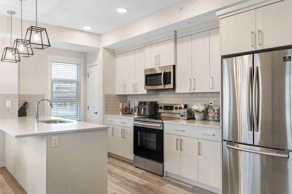 MLS® A2239040 - Unit #402 300 Harvest Hills Place NE in Harvest Hills Calgary, Residential