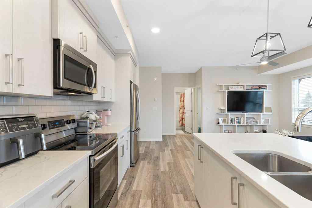 MLS® A2239040 - Unit #402 300 Harvest Hills Place NE in Harvest Hills Calgary, Residential
