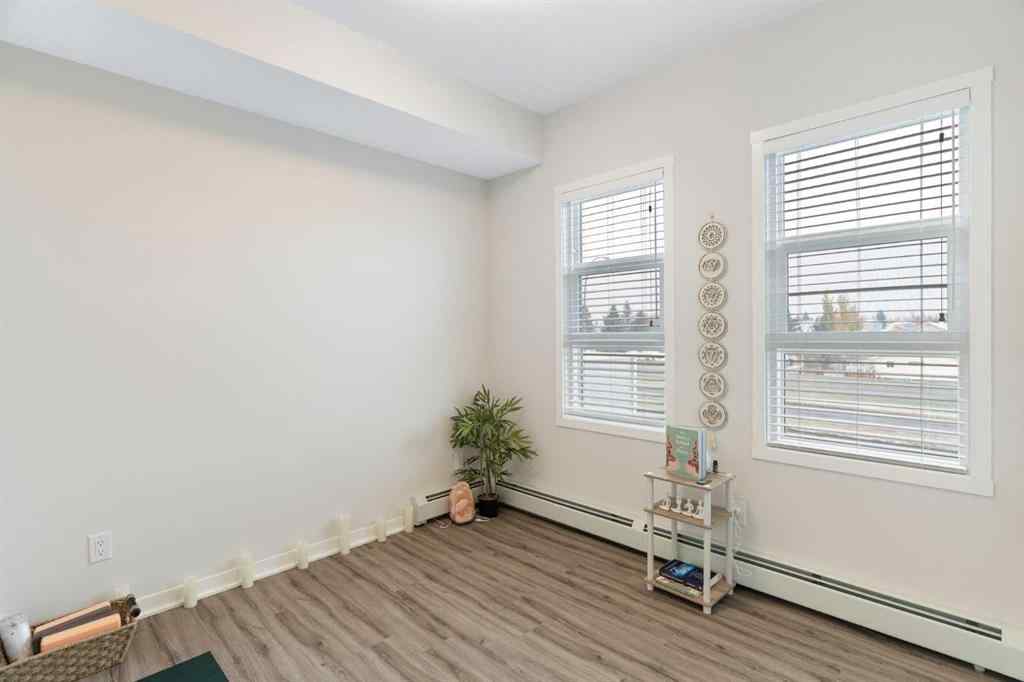 MLS® A2239040 - Unit #402 300 Harvest Hills Place NE in Harvest Hills Calgary, Residential