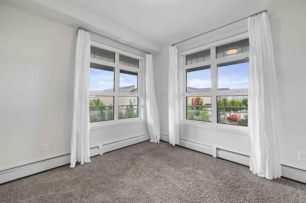 MLS® A2239043 - Unit #346 25 Auburn Meadows Avenue SE in Auburn Bay Calgary, Residential