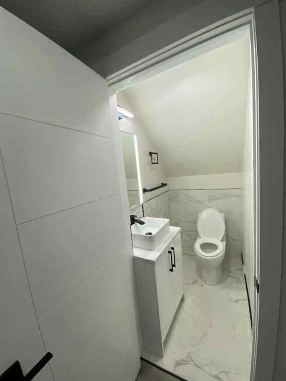 MLS® A2239044 - 35 Aspen Stone Way SW in Aspen Woods Calgary, Residential