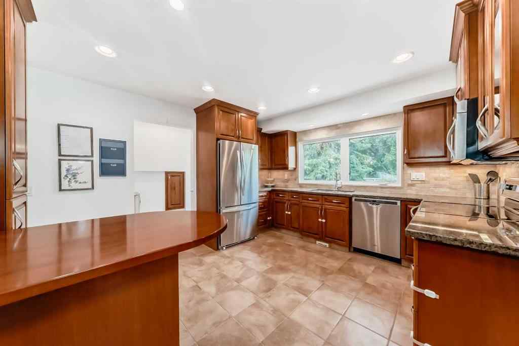 MLS® A2239069 - 832 Cannell Road SW in Canyon Meadows Calgary, Residential