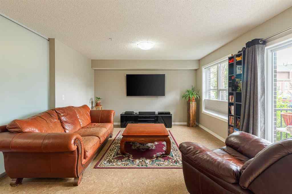 MLS® A2239071 - Unit #107 250 New Brighton Villas SE in New Brighton Calgary, Residential
