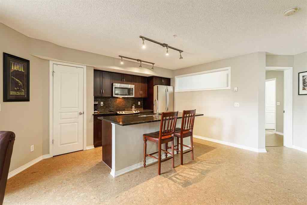 MLS® A2239071 - Unit #107 250 New Brighton Villas SE in New Brighton Calgary, Residential