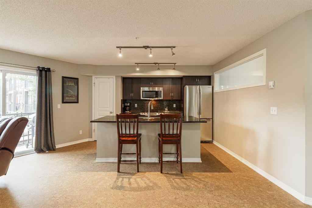 MLS® A2239071 - Unit #107 250 New Brighton Villas SE in New Brighton Calgary, Residential