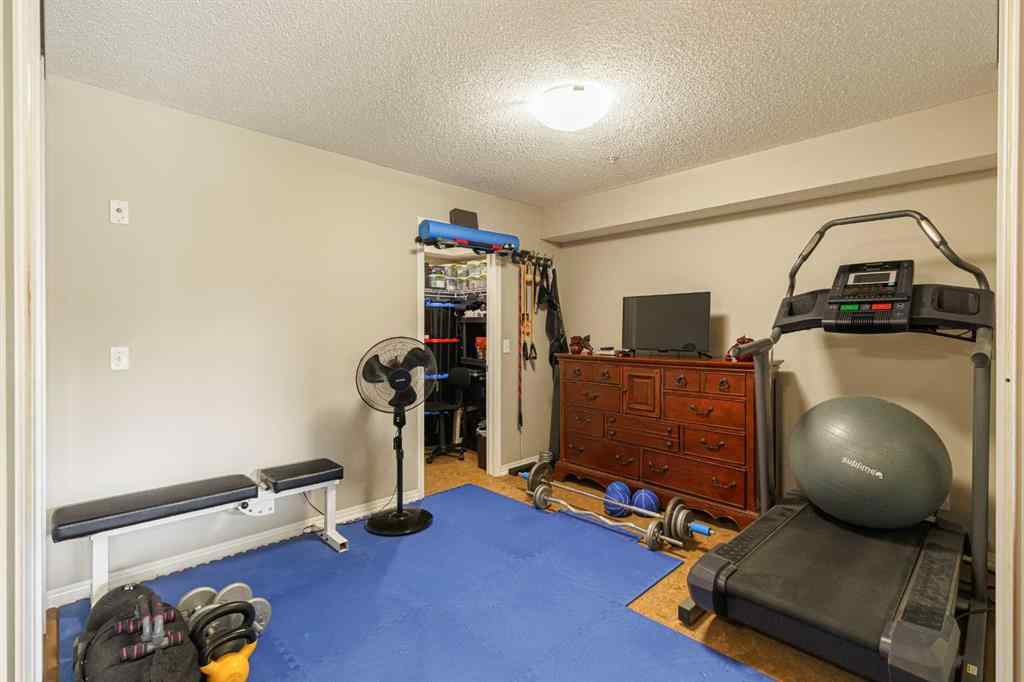 MLS® A2239071 - Unit #107 250 New Brighton Villas SE in New Brighton Calgary, Residential