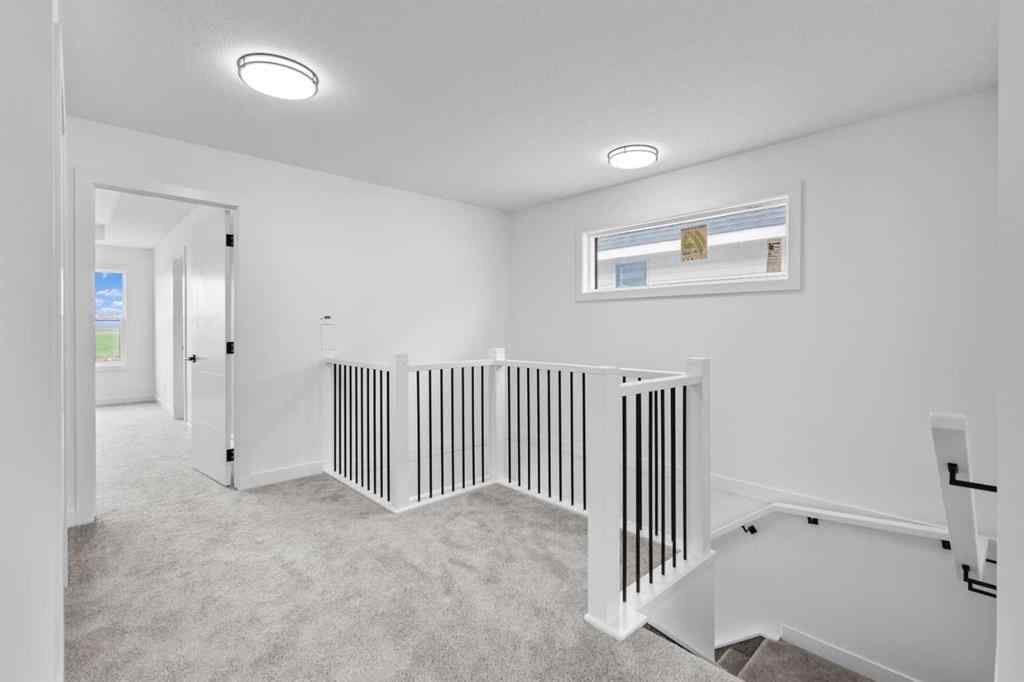 MLS® A2239089 - 1317 South Point Parade SW in South Point Airdrie, Residential
