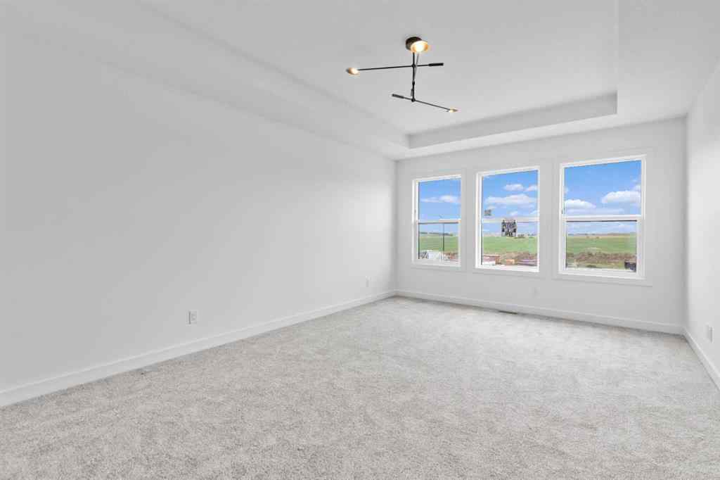 MLS® A2239089 - 1317 South Point Parade SW in South Point Airdrie, Residential