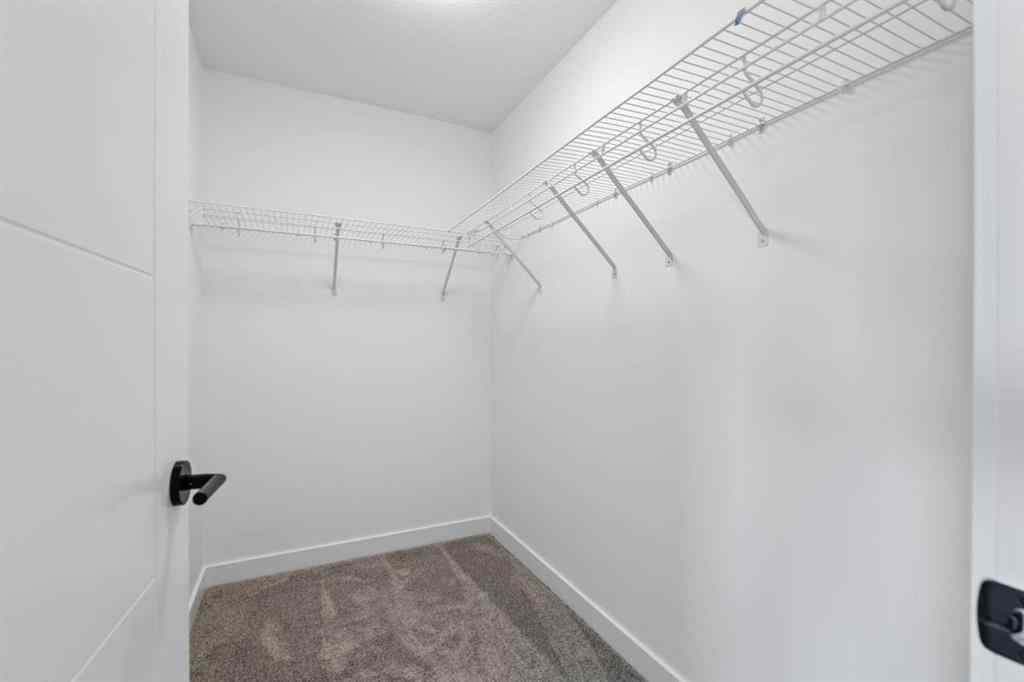 MLS® A2239089 - 1317 South Point Parade SW in South Point Airdrie, Residential