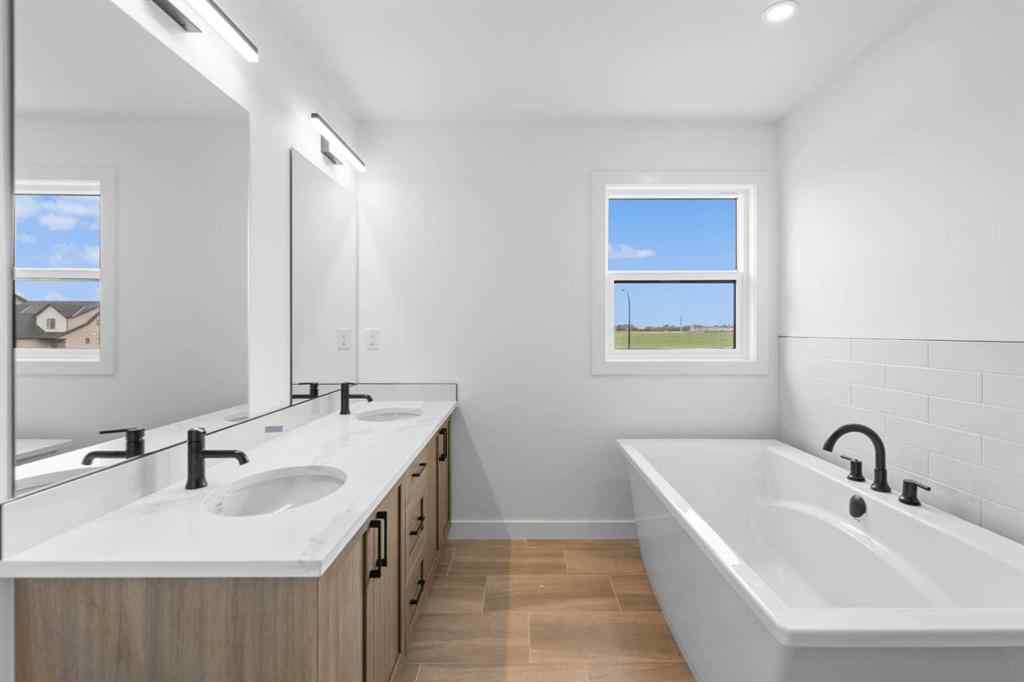MLS® A2239089 - 1317 South Point Parade SW in South Point Airdrie, Residential